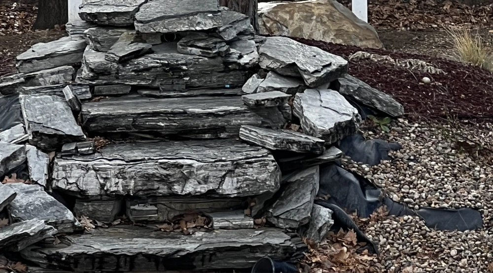 stones placed atop each other for an aesthetically pleasing waterfall effect